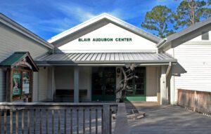 A building with a sign that says blair audubon center.