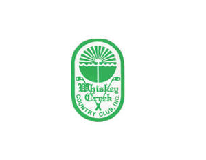 A green and white logo for the whiskey creek country club.